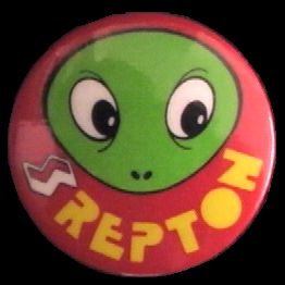 A REPTON badge given away with AROUND THE WORLD IN 40 SCREENS
